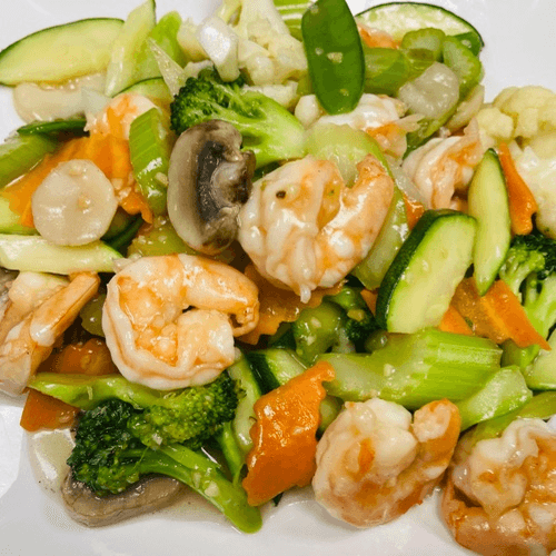 Shrimp and mixed vegetables with broccoli and mushrooms